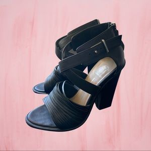 Super cute and sexy black Dolce Vita Sandals with a back zipper.